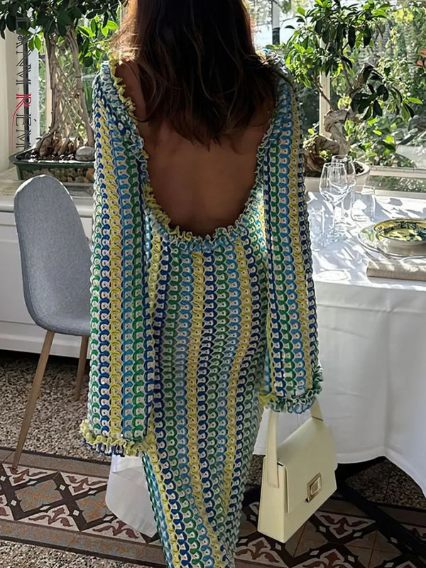 Robe fluide élégante en dentelle avec manches longues et motifs colorés